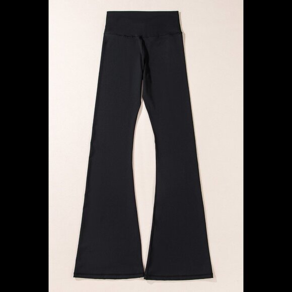 High-waisted crossover flared black leggings - Picture 6 of 10